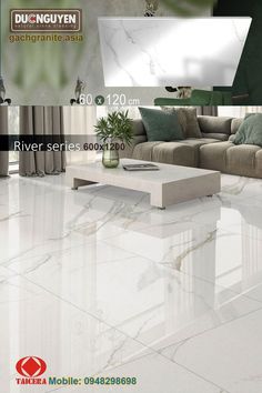 a living room with marble flooring and furniture in the background, there is a large white coffee table