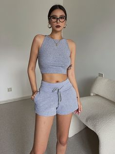 Grey Sports Shorts High Waist Student Loose Running Hot PantsFabric: BlendedColor: Black Khaki Light Grey Dark Grey Dark CoffeeSize: (unit cm)S Waist 60-70 Hips 88 Pants Length 27M Waist 64-74 Hips 90 Pants Length 28L Waist 68-78 Hips 92 Pants Length 29&ltp&gtWashing Suggestions: Hand wash recommended, hang to dry, do not bleach, low iron</p>&ltbr/>&ltp&gtPlease check the size carefully when you placing the order</p>&ltbr/>&ltp&gtFor more pictures please contact us</p>&ltbr/> Casual High Waist Activewear For Sports, Solid Color Summer Athleisure Joggers, Fitted Athleisure Joggers For Summer, Sleeveless Activewear With Elastic Waistband For Workout, Fitted Summer Athleisure Joggers, Summer Gym Sweatpants With Elastic Waistband, High Waist Sporty Sweatpants For Summer, Athleisure Short Pants For Gym, Summer Stretch Joggers Sportswear