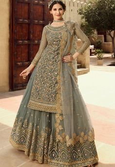 Buy Indian Wedding Lehenga grey net embroidered sharara style suit 15030 online in USA, UK and Canada from KollyBollyEthnics.com Long Choli Lehenga, Indian Wedding Lehenga, Kurti Style, Lehenga Suit, Lehenga Online, Net Lehenga, Ghagra Choli