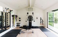 a home gym with exercise mats and equipment