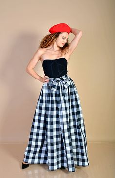 "This beautiful 80s black and white checkered skirt is made out of high quality soft cotton fabric. It is high waisted and has a separate 2,5m (8ft) long belt, made of the same fabric as the skirt and a hidden zipper on the side. You can tie the belt into a bowtie or however else you want. Pockets can be sewn in if you want to. Perfect for any day, that is special to you. Care: hand wash and hang dry Available Size: XS, S, M, L, XL, 2XL, 3XL, 4XL, 5XL, 6XL, 7XL, 8XL The model wears size M - 5,7' Plaid Cotton Long Skirt, Plaid Long Cotton Skirt, Plaid Cotton Skirted Bottoms, Long Plaid Cotton Skirt, Fitted Cotton Plaid Skirt, Plaid Cotton Flared Skirt, Plaid Cotton Tiered Skirt Bottoms, Cotton Plaid Flared Skirt, Plaid Cotton Tiered Skirt