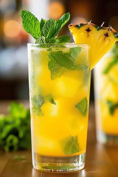 Indulge in the refreshing flavors of summer with this easy-to-make Pineapple Breeze Mojito! 🍍🌿 Perfect for poolside lounging or summer parties. #MojitoRecipe #SummerCocktail #PineappleMojito #TropicalDrink Pineapple Mojito, Perfect Summer Drink, Refreshing Summer Cocktails, Healthy Juice Recipes, Tropical Drink, Summer Cocktail, Summer Refreshments, Juice Recipes