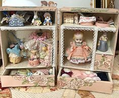 there are two open boxes with dolls in them