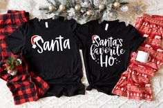 two matching shirts that say mock up and mock up next to a christmas tree with ornaments