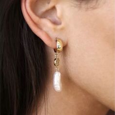 Show Off Elegant Shine In Polished Huggie Hoop Earrings Suspending Lustrous Freshwater Pearl Drops. 18k Gold Plated. Ettika Is A Contemporary Accessory Brand Based Out Of La Making Affordable Jewelry For Everyday. Sold At Revolve, Nordstrom And Similar. 2” Drop Post Back Imported Condition: Nwt In Original Packaging Box 5 White Gold-plated Pierced Pearl Earrings, White Gold Plated Pierced Pearl Earrings, White Gold-plated Dangle Pearl Earrings, White Gold Plated Dangle Pearl Earrings, White Drop Earrings Gold Plated, White Drop Gold Plated Earrings, White Gold-plated Earrings With Pearl Charm, White Pearl Chain Gold-plated Earrings, White Gold Plated Pearl Chain Earrings