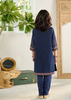 2-Piece Embroidered Suit for Girls (shirt & trouser only). Description DescriptionKameez (Shirt) : Crafted on a solid palette with exquisite embroidery details on shirtShalwar (Trouser) : Plain straight raw-silk pants.Fabric : Paper cotton. Navy Blue Girls Dress, Embroidered Suit, Shirt Trouser, Girls Blue Dress, Pants Fabric, Girls Shirt, Silk Pants, Fabric Paper, Fashion Consultant