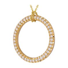 Diamond Circle of Life Necklace Mounted in 18k Yellow Gold This open circle pendant, encrusted with 42 round brilliant diamonds set in 18K yellow gold, is a gorgeous example of a classic motif symbolizing eternity and never, ending love. It's 1-inch diameter is perfect for everyday style. TCW: ~1ct Chain Length : 16" adjustable Weight: 7.9gr Circle diameter: 26.7mm Comes in showcase box, Appraisal available upon request David Yurman Jewelry, Circle Diamond, Circle Of Life, Circle Pendant, Brilliant Diamond, Round Brilliant, Diamond Jewelry, Everyday Fashion, Jewelry Necklace Pendant