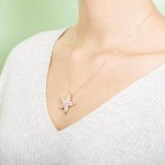 This 925 sterling silver gold vermeil pendant features our original Hau'oli, or happy, starfish motif paired with pavé topaz gemstones. Starfish, or Hokuhele, is a representation of the guiding star that will protect you through troubled waters. Poseidon extinguished the stars in the sky and made them fall into the sea in the form of little stars so that a young man could give them to his beloved. From that moment on, the starfish has been considered a true love charm. Details: Brand: Alamea Mat Stars In The Sky, Starfish Pendant, Love Charms, Star Sky, Topaz Gemstone, Starfish, Gold Vermeil, Sterling Silver Pendants, Silver Pendant