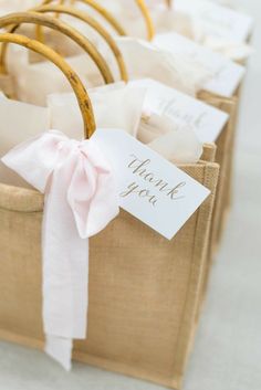 a basket filled with lots of different types of items next to a thank you sign