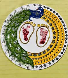 a plate with two pairs of feet on it