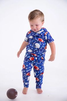 This adorable set is crafted from incredibly soft and breathable viscose from bamboo, cotton, and spandex for an irresistibly comfortable fit! The set features an adorable design perfect for those days spent rooting for your favorite team [toddler girl outfits jumpsuits and rompers, cute toddler girl outfits, toddler boy outfits, toddler boy rompers, football sweatsuit, football pajamas, jumpsuits and rompers, #sweaters #bamboo #toddlerfashion] Shop Birdie Bean Baby today!