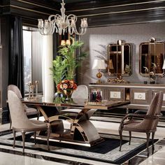 an elegant dining room with chandelier, chairs and table in the middle of it