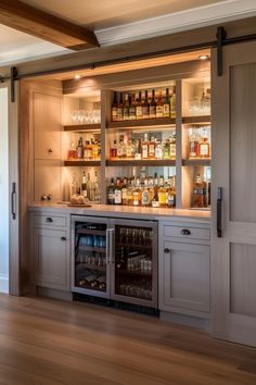 a home bar with lots of bottles and glasses