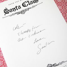 an autographed copy of the santa claves album is shown in this undated photograph