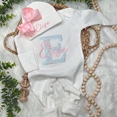 This Personalized baby outfit set will make a wonderful, personalized baby gift for the proud parents. The outfit is the perfect coming home outfit for the new bundle of joy and will be a cherished family keepsake. The sets can include a gown, footie, bodysuit, beanie hat, headband with bow,  and bib. You can also add a blanket and I will make it match the embroidered set.   ♥RUSH MY ORDER♥ Add this listing to your cart along with your items. https://etsy.me/3dbKtZh ♥PRODUCTION TIMES♥ My current Fitted Cotton Sets For Gifts, Personalized White Cute Sets, Customizable Cotton Sets For Baptism, Personalized Fitted White Sets, Personalized Fitted White Set, Customizable Fitted Cotton Sets, Customizable Fitted Sets For Baptism, Coming Home Outfit Boy, Hat Headband