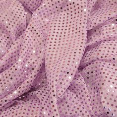 This polyester sequin fabric is sure to add pizzazz to any costume, from dance recital dresses to fun purses to Halloween costumes! The lovely metallic sheen is offset beautifully by the see-through polyester backing. Perfect for layering, it's very light weight but surprisingly resistant to tearing. A lovely, liquid draping quality adds to the enchantment! It's the perfect material for Disco Night, cheer bows, Halloween and dance costumes. Purple Sequin Fabric For Spring Party, Pink Glitter Sequin Fabric For Spring, Spring Disco Sequin Fabric With Glitter, Spring Disco Glitter Sequin Fabric, Purple Sequin Fabric For Summer Party, Pink Glitter Sequin Fabric For Summer, Purple Sequin Fabric With Glitter Print For Party, Summer Pink Sequin Fabric With Glitter, Party Purple Sequin Fabric With Glitter Print