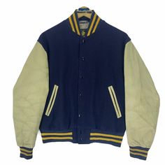 Vintage 90s Golden Bear leather varsity jacket in navy blue colour. Button up wool jacket. Still in good condition EXCEPT some stains on the lining inside. SEE THE PICTURES FOR MORE DETAILS. CONDITION : 8/10 MEASUREMENT Pit : 23.5 inch Length : 23.5 inch Shoulder : 19 inch Arm Length : 24.5 inch Size On Tag : S Recommended Size : M-L PAYMENT We accept PayPal only. The item will be ship 3-5 days once the payment has been made. SHIPPING DHL ONLY. USUALLY AROUND 7-21 DAYS BEFORE REACH THE DESTINATI Wool Outerwear With Button Closure For Streetwear, Classic Navy Varsity Jacket For Fall, Blue Varsity Jacket With Button Closure For College, Blue College Varsity Jacket With Button Closure, College Blue Varsity Jacket With Button Closure, Classic Navy Outerwear For College, Classic Navy Varsity Jacket With Ribbed Cuffs, Classic Navy Varsity Jacket For College, Blue Varsity Jacket With Button Closure For Streetwear