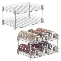 three tiered spice rack with pots and pans on the bottom one shelf is clear