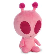 a pink alien stuffed animal sitting on top of a white surface