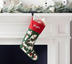 a christmas stocking hanging from a mantel