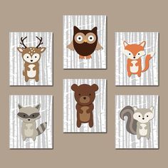 four nursery wall art prints featuring deer, fox, and letter e in various colors