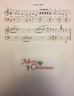 sheet music with merry christmas written on it