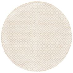 a round white rug with an intricate pattern on the top and bottom, against a white background