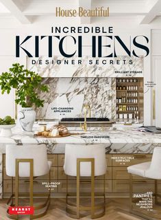 the front cover of house beautiful magazine with marble countertops and white chairs in an elegant kitchen