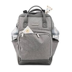 a gray backpack with a white bird on it's back pocket and two pockets