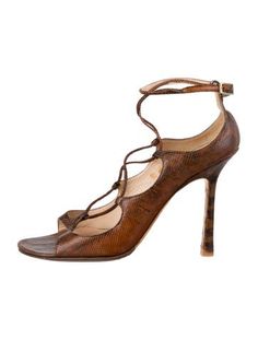 Jimmy Choo Leather SandalsBrownWrap-Around Straps & Buckle Closure at AnklesFit: This style typically runs a full size small.Unfortunately, due to restrictions, this item may not be eligible for shipping in all areas. Fitted Brown Sandals With Heel Strap, Brown Heels With Adjustable Ankle Strap, Brown Adjustable Ankle Strap Heels, Adjustable Brown Ankle Strap Heels, Brown Sandals With Wrapped Heel, Fitted Brown Sandals With Wrapped Heel, Brown Leather Strappy Heels, Brown Ankle Wrap Sandals For Spring, Saint Laurent Bag