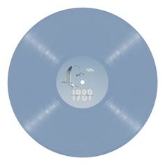 a blue record with an image of a seagull flying in the sky on it