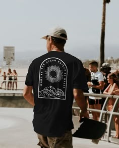 Time to get stoked with this epic shirt. ↪ From Europe? Order here https://www.surfersartshop.com/products/raised-by-the-ocean-shirt ↪ See the faces behind on Instagram @surfersartshop   PRODUCT DESCRIPTION  - Luxurious comfort and style are what this unisex, garment-dyed shirt is all about - The unisex soft-style t-shirt puts a new spin on casual comfort - Made from very soft materials, this tee is 100% cotton for solid colors - The shoulders have twill tape for improved durability - There are Surfing Crew Neck T-shirt With Front Print, Black Surfing T-shirt With Screen Print, Surfing T-shirt With Front Print And Short Sleeves, Graphic Tee T-shirt For Surfing With Relaxed Fit, Crew Neck T-shirt With Front Print For Surfing, Relaxed Fit Graphic Tee For Surfing, Graphic Tee With Relaxed Fit For Surfing, Surfing Graphic Print Crew Neck T-shirt, Surfing Graphic Tee With Crew Neck