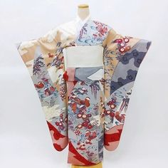 Cover yourself in flowers &  migrating ducks wearing this traditional Japanese silk Furisode kimono in salmon, gray and pink.    Made of high quality silk threads.  Beautiful on or as a room display too. Item: Furisode Silk Kimono No. Syfu060 Size: US  L-XL   /  Length 64.25 inch (163.5cm), Width 26.25 inch (67cm). Design :  Duck and Floral. Condition: Used, Very Good. Please check the photos. Need a Obi sash to wear this kimono? Find it here: https://www.etsy.com/shop/KimonoFujiyamarock?ref=simple-shop-header-name&listing_id=1418707729&section_id=13757607&sort_order=date_desc Shop the entire collection https://fujiyamarock.etsy.com Ships by Express DHL, 5-10 day delivery from shipping date. Thanks so much for visiting! Multicolor Spring Wedding Kimono, Silk Kimono Dress, Furisode Kimono, Obi Sash, Dress Kimono, Long Sleeve Kimono, Wedding Kimono, Room Display, Japanese Silk