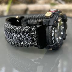 "Handcrafted with 100% Nylon Paracord \"MADE IN USA\".   Our Products include:    ➖Custom handcrafted watch bands \"According to You\". No matter how small or big your wrist size, we will craft your perfect fitting band (wrist size picture measurement required).  ➖Variety of styles to choose from. You may order your band \"As pictured\", or feel free to request changes. If you don't see your favorite style in our page or watch category yet, please contact us and we can discuss your options.  ➖Variety of buckles or clasps (Prices may vary).  ➖FREE FIRST CLASS USPS SHIPPING FOR DOMESTIC U.S. ORDERS (Includes U.S. Military APO/FPO Address Overseas).  Please, refer to policies for handcrafting time frames https://www.etsy.com/shop/Cording2U#policies. These may vary month to month depending on Adjustable Paracord Watch Bands For Outdoor, Black Paracord Watch Accessories For Outdoor, Outdoor Black Paracord Watch Accessories, Durable Silver Watch Bands For Outdoor, Silver Durable Watch Bands For Outdoor, Outdoor Durable Silver Watch Bands, Silver Bracelet Strap Watch Band For Outdoor, Silver Watch Band With Bracelet Strap For Outdoor, Adjustable Silver Watch Bands For Outdoor Use