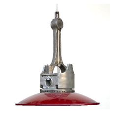 a close up of a red light fixture on a white background with no one around it