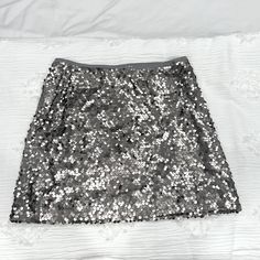 Express Small Gray/Silver Shimmer Sequins Lightweight No Tags, But Never Worn From Top Of Skirt To Bottom Is About 14.5 Inches Body & Lining: 100% Polyester Silver Sparkly Mini Skirt, Silver Sequined Mini Skirt, Sequin Party Skirt, Short Length, Fitted Knee-length Sequin Skirt, Luxury Silver Sequin Skirt, Silver Skirt, Sequin Skirt, Womens Skirt, Sequin