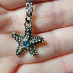 Cute Little Starfish On A 16 Inch Chain. As You Can See The Starfish Has A Beautiful Blue Stone In The Center. Bundle This Necklace With A Pair Of The Starfish Earrings And I Will Send You A Great Offer On The Set!! Metal Starfish Charm Jewelry, Blue Star-shaped Nickel-free Necklace, Starfish Earrings, Starfish Necklace, Blue Stone, Girly Girl, Beautiful Blue, Starfish, Womens Jewelry Necklace