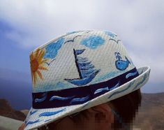 "A phone number is needed along with your order!♥ Hand Painted Kid's Straw Hat \"Sailing Boat\" ♥ ♥ The MUST HAVE hand painted straw hat from \"GiftStoriesGr\"!  This straw hat is created in sunshine Greece and all the details are 100% hand painted. Perfect for any occasion under the sun! Take it to the beach, Bachelorette party, Vacation, Seaside wedding and christening, Summer beach parties....In all occasion! DETAILS: ❀ Unique Hand painted straw hat painted with love and imagination. Sea, Sun Adjustable Nautical Hats For The Beach, Adjustable Nautical Beach Hat, Nautical Beach Hat With Curved Brim, Nautical Style Beach Hat With Curved Brim, Bachelorette Party Vacation, Summer Arts And Crafts, Boat Hat, Whale Painting, Toddler Beach