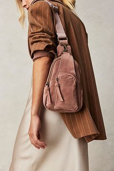 Shoulder the load with an of-the-moment sling bag. **Features:** Sling style, suede fabrication, adjustable woven strap, outer pocket **Why We | Hudson Sling Bag by FP Collection at Free People in Orange Madewell Commuter Bag, Coach Sling Backpack, Leather Sling Bags Women, Sling Bag Outfit, Sling Backpack Purse, Sling Bag Women, Leather Sling Bags