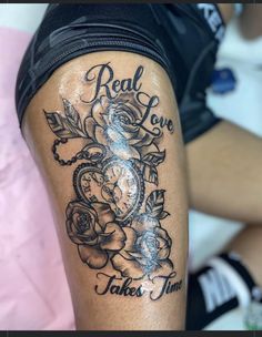 a woman's arm with a tattoo on it that says real love takes time