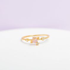 Need some space? Then this is the ring for you! Our I Need Space Ring features a Girls Crew signature pink gem that is so flirty and feminine. 18k gold plated, 18k rose gold plated, or rhodium plated over brass with a protective coating Cubic zirconia stones Available in sizes 6-8 5mm width Shop our entire GC Galaxy Collection here! Adjustable Pink Rings For Proposal, Pink Moonstone Promise Ring, Pink Open Ring Midi Rings For Wedding, Pink Birthstone Ring For Proposal, Space Ring, Space Rings, I Need Space, Pink Gem, Necklace Chain Lengths