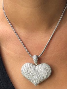 Vintage14k Italian Fancy Large Pave Diamond Heart Pendant locked in White Gold, Valentine's Gift, Heart Necklace, Love Necklace Handmade Diamonds: Approximately 10 ½ Crats  Diamonds: Color G-F Clarity VS1-VS2 Weight: 24.72 gr Width: 1.91" (48.45mm)  Length: 1.42" (36.8mm) Metal: 14K White Gold Marked: 585 Retail Value:$26000.00 This vintage Large Pave Diamond Heart Pendant and locked in 14K Gold TW 24.72 grams and approximately 10 1/2 carats of dazzling pave set over 500 round diamonds Color G-F clarity  VS1-Vs2, The chain is not included  Return policy Notification within 5 to 7 days upon receipt, no exceptions. Buyer pays insured and trackable shipping Not as described will be issued a full refund, including shipping costs after the item is returned. Buyer must show evidence as such.   R Necklace Love, Heart Pendant Diamond, Valentine's Gift, Love Necklace, Necklace Handmade, Diamond Heart, Pave Diamonds, Heart Necklace, Handmade Necklaces