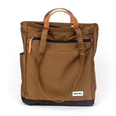 Meet the new Tote Pack in taupe. Carry as a tote with the strong leather handles or use the convertible straps for over your shoulder look or as a backpack. Made from strong weather-resistant polyester and the finest eco-friendly, vegetable tanned, biodegradable leather.  Size: 13" x 5" x 16" Weather resistance-polyest Free Tote, Sew Easy, Needful Things, Product Development, Backpack Straps, Work Bags, Waxed Canvas, Leather Handles, Sewing Bag