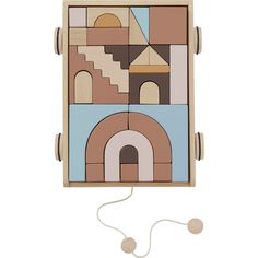 a wooden puzzle with different shapes and colors