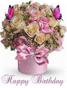 a bouquet of flowers in a pink vase with butterflies on it and the words happy birthday