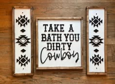 three wooden signs that say take a bath you dirty cowboy and have arrows on them