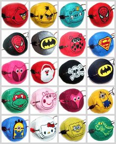 many different colored hats with cartoon characters on them and one is wearing a batman mask