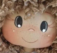 a close up of a doll with curly hair on it's head and eyes