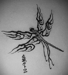 an ink drawing of a dragon with chinese writing on it's back and wings