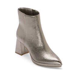 Add some sparkling glamor to your looks with this pair of Worthington women's Bannow flared heel booties. Crafted from a metallic faux leather, this pointed-toe pair has a side zip closure, a sturdy high flared heel and a memory foam insole for added comfort. Wear them with skinny jeans or a dress and tights. Features: Memory FoamClosure Type: Side Zipper, Pull OnFootwear Technology: Memory Foam InsoleShaft Circumference: 10 1/2 InchesBoot Shaft Height: 3 1/2 InchesPlatform Shoe Height: 1 InchSh Sparkling Pointed Toe Heels For Fall, Party Boots With Shimmer And Pointed Toe, Metallic Pointed Toe Boots For Fall, Metallic Ankle Boots For Fall, Glamorous Round Toe Boots For Holidays, Glamorous Holiday Boots With Round Toe, Glamorous Shimmer Boots With Pointed Toe, Glamorous Shimmer Pointed Toe Boots, Glamorous Glitter Ankle Boots